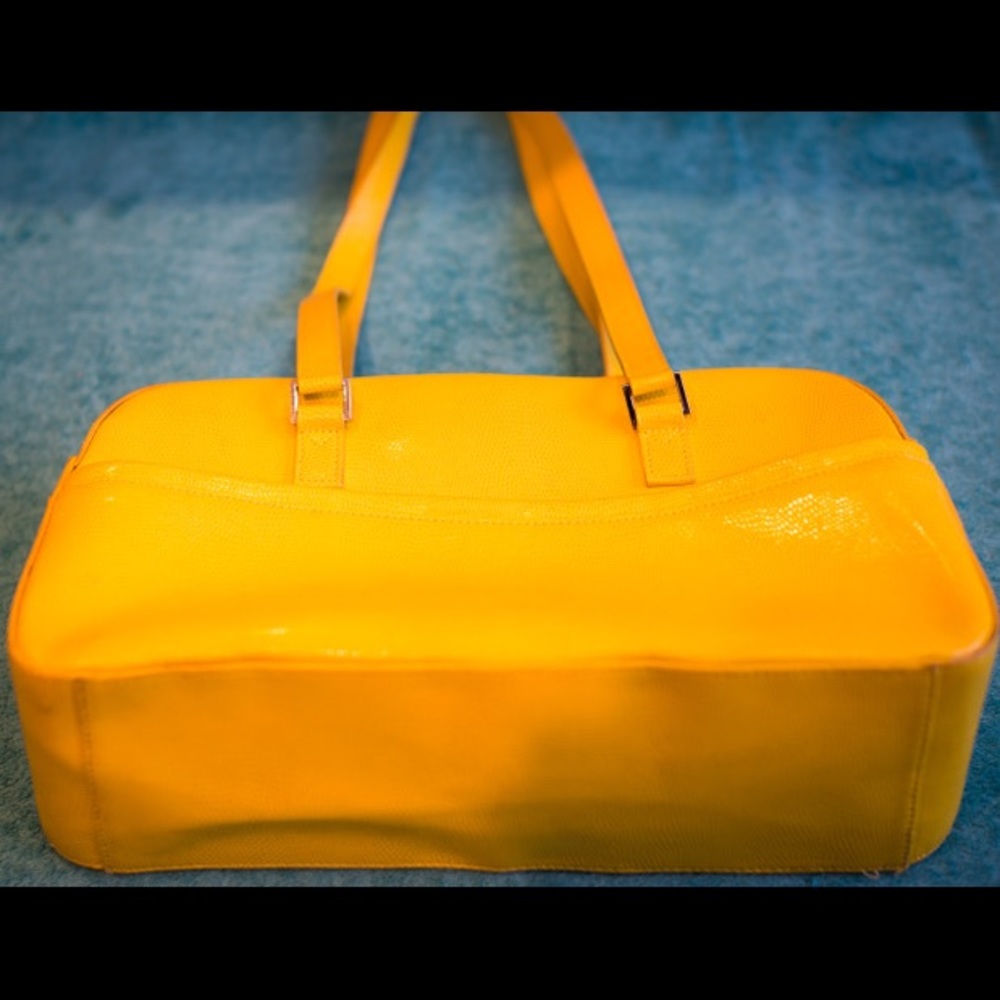 Cleo and Patek Paris pebbled leather yellow purse